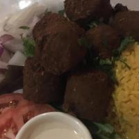 Falafel · Served with a side of tahini sauce and saffron rice.