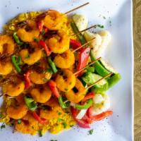 Shrimp Kebab · Shrimp skewers in garlic, olive oil, and lemon marinade.