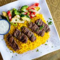 Kofta Delight · Hand pressed finely shredded beef with Ras el Hanout spice blend. Served with vegetables and...