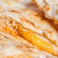 Kids Quesadilla · Includes shoestring fries