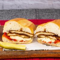 The Ccm · Breaded chicken cutlet, fresh Mozzarella cheese, roasted peppers, and balsamic vinegar.