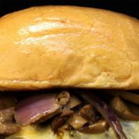 Slam Dunk Mushroom Burger · Sautéed mushrooms, fresh ground beef patty, Swiss cheese, grilled red onions, green leaf let...