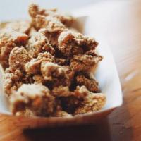 Popcorn Chicken · Our signature homemade popcorn chicken! Made with fresh chicken thigh meat breaded in our sp...