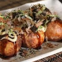 Takoyaki · A popular Japanese snack. A wheat based batter with a piece of squid in the middle deep frie...