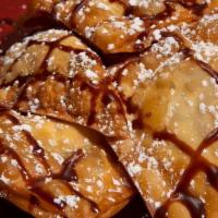 Nutella Wontons · Our house made nutella wontons! Nutella wrapped in a wonton wrapper fried deep fried and top...