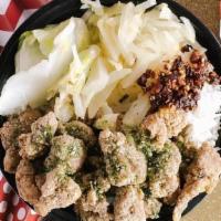 Popcorn Chicken Bowl · Our popcorn chicken with a side of rice, white kimchi and pickled radish. Add some furikaki ...