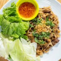 Guay Teaw Kua Gai · Stir-fried Flat rice noodle w/ eggs, bean sprout, pickled radish & mixed soy sauce. Served w...