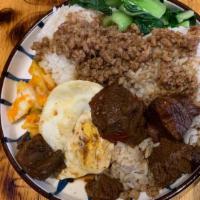 Beef Over Rice With Poached Egg · Our food may contain peanut or tree nut products.