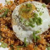 Fried Rice · (But like, make it brunch). Bacon, peas, XO sauce, and a fried egg.