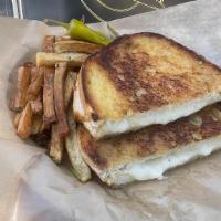 Oh My Grilled Cheesus On Sourdough With Fries · Artisan sourdough bread, fresh mozzarella & provolone and butter spread.