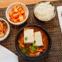 Kimchi Jjigae · KIMCHI STEW WITH SLICED PORK, TOFU, ONION, AND SCALLIONS