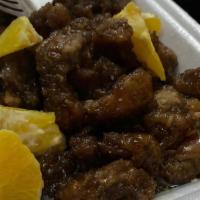Orange Beef * · Slices of breaded beef in a sweet and spicy orange sauce (spicy)