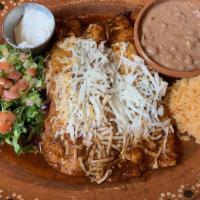 Enchiladas (3) · Rojas, verdes, mole. served with a side of rice, beans choice of steak, cheese, or chicken