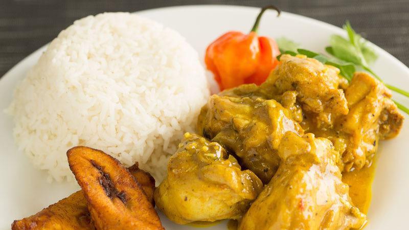 Curried Chicken · Small pieces of chicken seasoned and cooked in Jamaican curry sauce.
