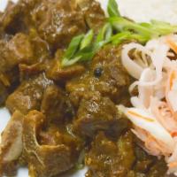 Curried Goat · Goat meat marinated and cooked in curry sauce and other Jamaican spices.