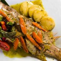 Steamed Fish · Fresh snapper steamed with vegetables and okra.