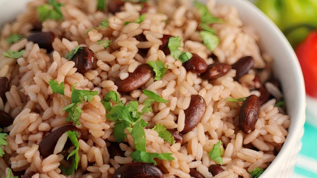 Rice & Beans · A traditional Jamaican recipe made with red beans, thyme and coconut milk
