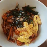 Chinese Style Bibimbap · Stir-fried of sliced seafood, vegetables, mushroom with rice.