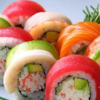 Rainbow Roll · California roll topped with salmon, shrimp, tuna, white fish and avocado. 8 pieces.