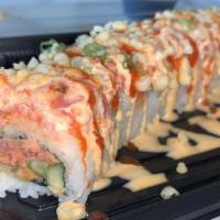 Deluxe Spicy Tuna · Spicy crunchy tuna topped with spicy tuna, crunch, spicy mayo, green onion and hot chili sau...