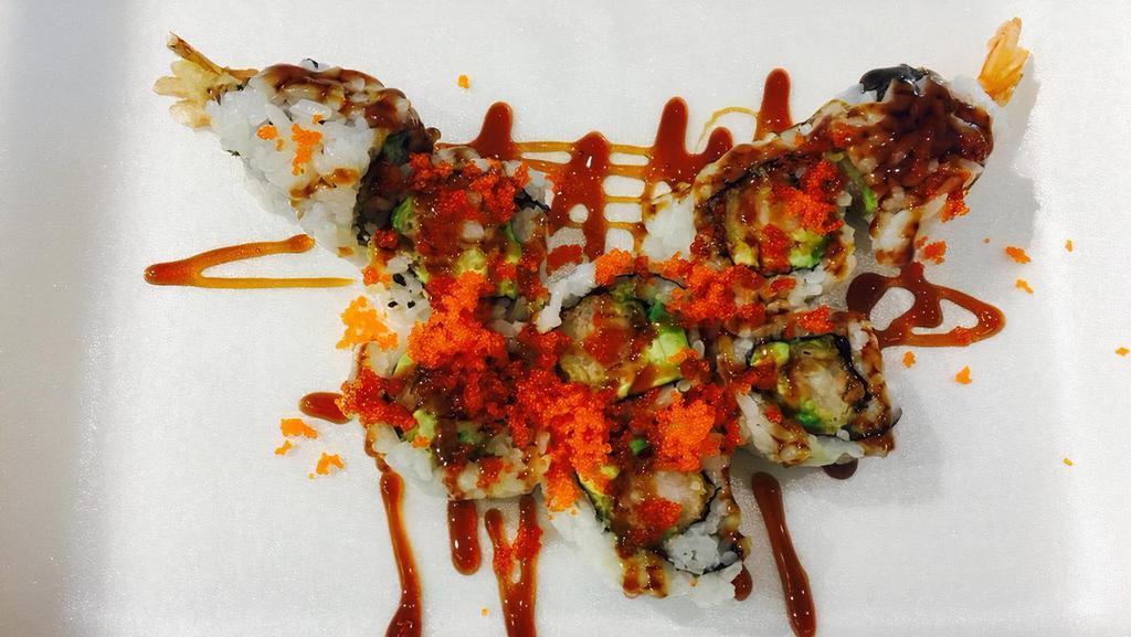 Tiger Roll · Double shrimp tempura, avocado, eel sauce and masago.