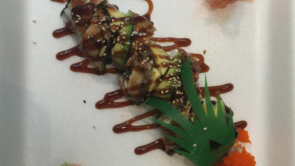 Dragon Roll · BBQ eel on top of the California roll with eel sauce, avocado and masago. 8 pieces.