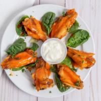 Chicken Wings (6 Piece) · Chicken wings with your choice of sauce such as buffalo, BBQ, or honey mustard.