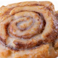 Cinnamon Biscuit Roll · Made in house with our Famous Biscuit Dough topped  with a sweet glaze.