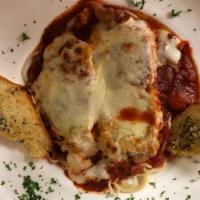 Chicken Parmigiana · Chicken breast covered with mozzarella served with spaghetti in marinara sauce.