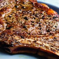 Cowboy Bone-In Rib Eye (22Oz)-“On Special” · 22oz Bone In Rib Eye,  Certified Black Angus, seven spice seasoned, grilled and served with ...
