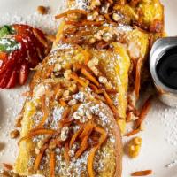 Carrot Cake Stuffed French Toast · Cinnamon egg-dipped artisan bread grilled + filled w/sweet ricotta cream cheese, topped w/ a...