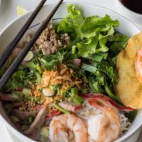 Hu Tieu Mi · Rice & egg noodles, shrimp fritter, garlic chives. A Vietnamese-Cambodian concoction.