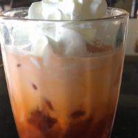Tra Thai · Thai iced tea with milk & cream (add boba for an additional charge.