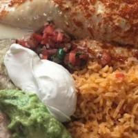 Burrito Jose · Stuffed with pork,  cooked with tomatoes, onions, bell peppers. Served with rice and beans. ...