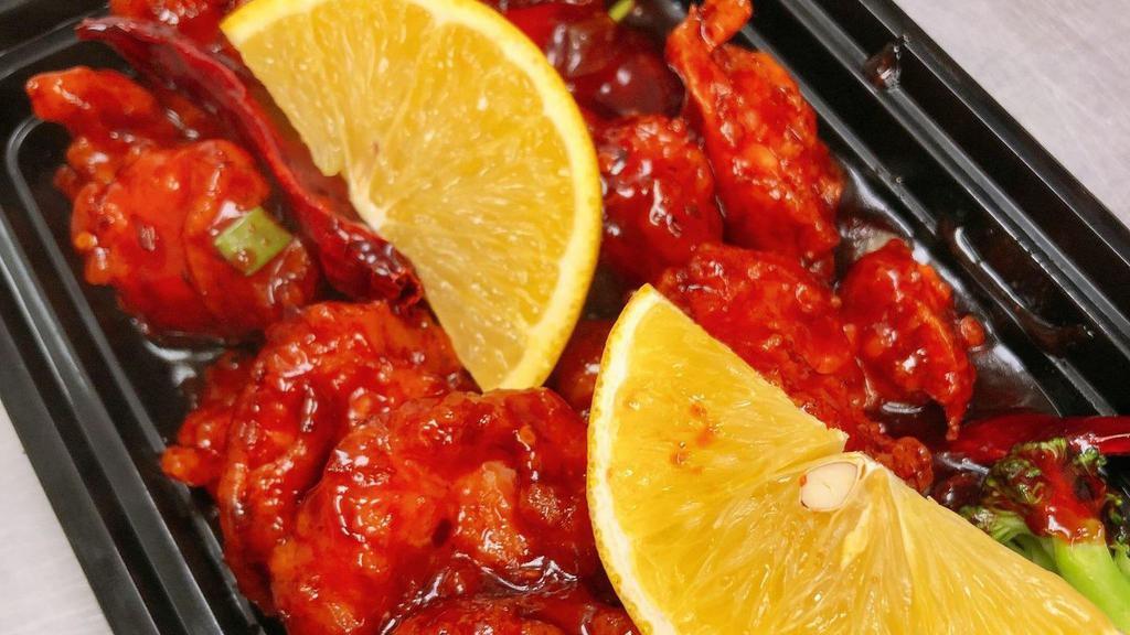 Orange Shrimp · Spicy. Includes: Steamed rice, 1 egg roll, 2 chicken wings, & 1 soup of your choice.