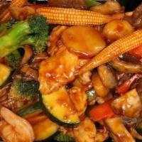 Happy Family · Chicken, beef and shrimp with mix vegetables in brown sauce.