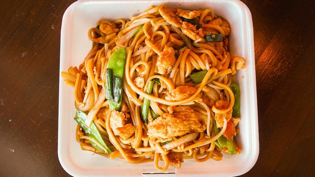 Chicken Lo-Mein · Chicken and soft lo-mein noodles with nappa snow peas sprouts green onions and celery stir-fried with light brown sauce.