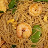 Singapore Style Rice Vermicelli · Chicken shrimp and vermicelli noodles with nappa snow peas sprouts green onions and celery s...