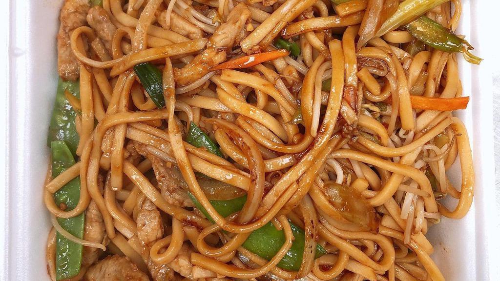 Pork Lo-Mein · Pork and lo-mein noodles with nappa snow peas sprouts green onions and celery stir-fried with light brown sauce.