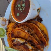 Birria Taco Plate · Three tacos with rice and beans and one dipping sauce.