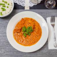 Royal Butter Chicken · Boneless fresh chicken pieces broiled in Indian spices and cooked in buttery cream tomato sa...