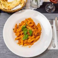 Chicken Makhani Penne Ala Vodka · Masala marinated grilled or fried chicken slowly cooked in Indian spices creamy sauce served...
