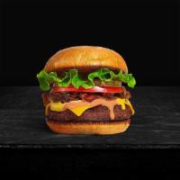More Classic Times Burger · Seasoned half-pound angus patty perfectly cooked to medium on a griddled bun. Served with fr...