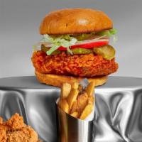 Fired Up Chicken Sandwich · Hot stuff. Crispy fried chicken, fresh tomatoes, crispy lettuce, and hot sauce. Served on a ...
