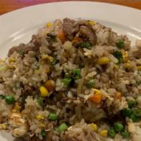 Com Chien (Fried Rice) · A choice of Shrimp, Beef, Chicken or Pork with mixed vegetables and fried rice