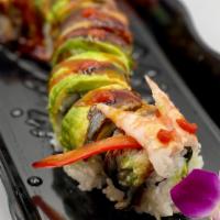 Dragon Roll · Shrimp Tempura with Cucumber inside. Topped with Eel, Avocado, Sesame Seeds, and Sauces