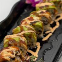 Skydiver Roll · Soft-Shelled Crab and Cucumber topped with Eel, & Avocado.