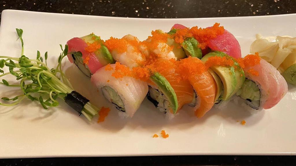 Rainbow Roll · Crab meat & cucumber with avocado, tuna, salmon, shrimp, and red snapper on top.