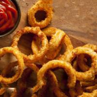 Onion Rings · Thick cut, battered onion rings fried to crispy, golden perfection.