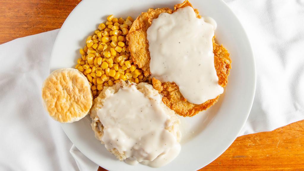 Chicken Fried Chicken · Served with mashed potatoes, gravy and corn.